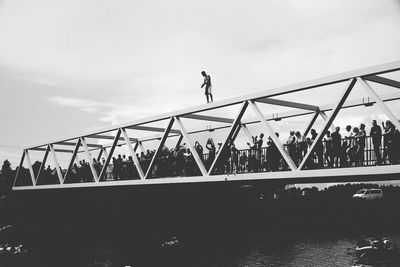 Low angle view of silhouette man against sky