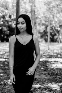 Young woman standing at park