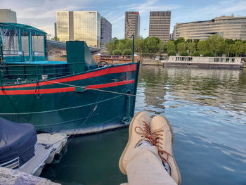 Low section of man on boat in canal