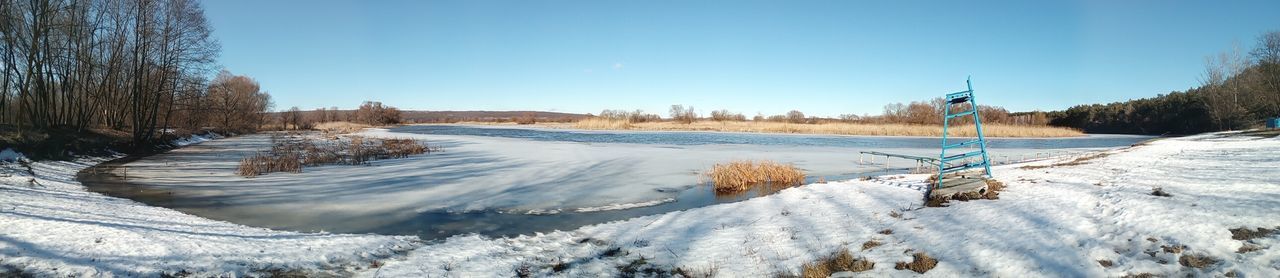 snow, winter, cold temperature, clear sky, season, tranquility, tranquil scene, frozen, nature, blue, beauty in nature, covering, landscape, scenics, snow covered, copy space, sunlight, weather, field, non-urban scene