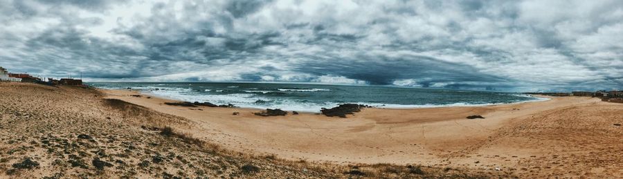 Panoramic view of beach against sky