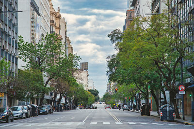 People walking on street in city