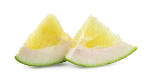 Close-up of bananas against white background