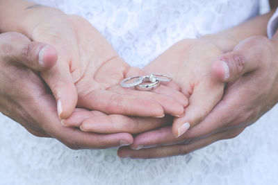 Close-up of woman holding hands