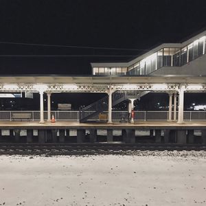 Train at railroad station at night