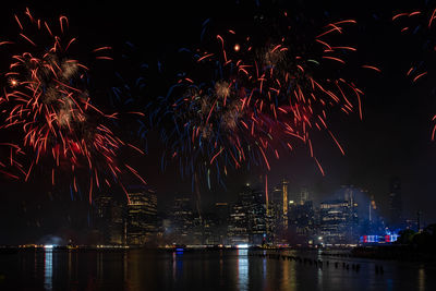 Firework display at night