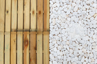 Stones and pine wood tiles on the terrace, europe