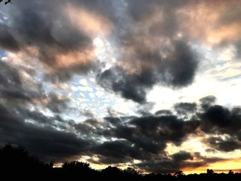 Low angle view of dramatic sky during sunset