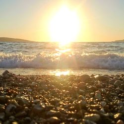 Scenic view of sea at sunset