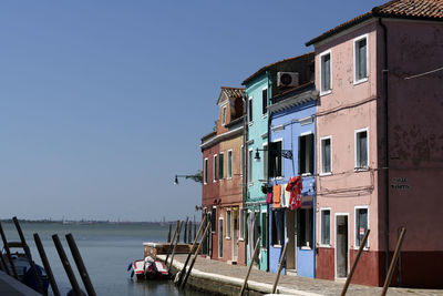 Panoramic view of buildings in burano against clear sky