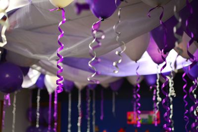 Decorative balloons and ribbons hanging during party