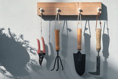 Close-up of clothes hanging on wall