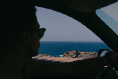 Scenic view of sea seen through boat