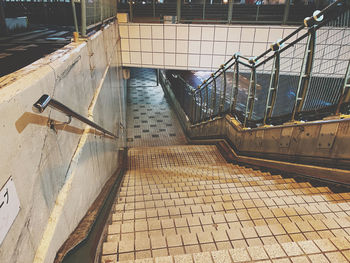 High angle view of staircase by swimming pool