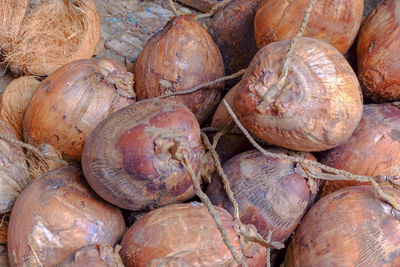 Full frame shot of onions for sale at market