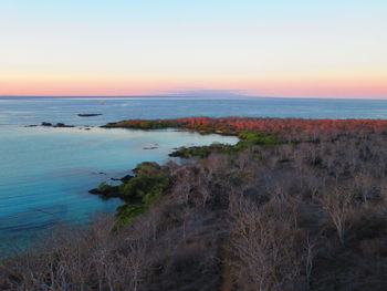 Scenic view of sea at sunset