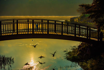 View of bridge over water against sky