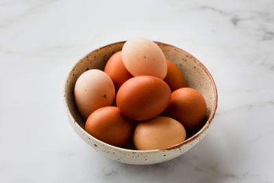 High angle view of eggs in container