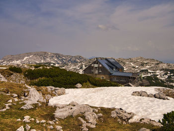 Scenic view of snowcapped mountain against sky