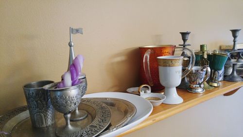 Close-up of glasses on table at home