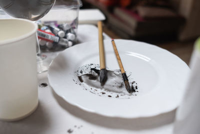 Close-up of coffee served on table