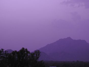 Scenic view of silhouette mountains against clear sky