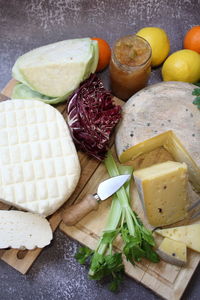 High angle view of fruits on cutting board