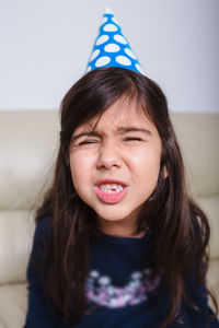 Portrait of cute girl at home