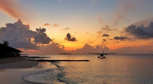 Scenic view of sea against sky during sunset