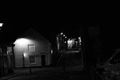 Illuminated street light at night