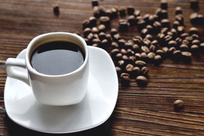 Close-up of coffee cup on table