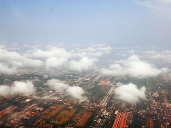 High angle view of buildings in city against sky