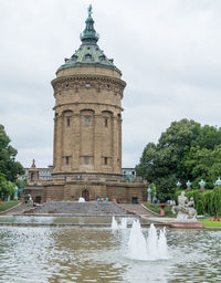 Fountain with buildings in background