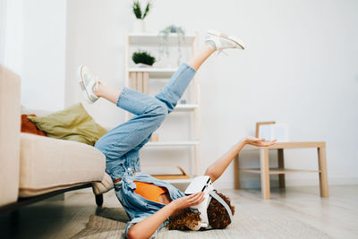 Low section of woman exercising in gym