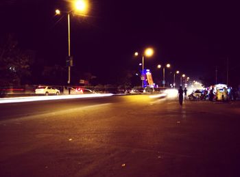 Illuminated street lights at night