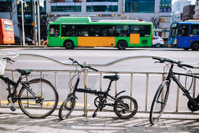 Bicycles parked on street in city