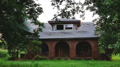 View of building with trees in foreground