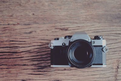 Close-up of camera on table