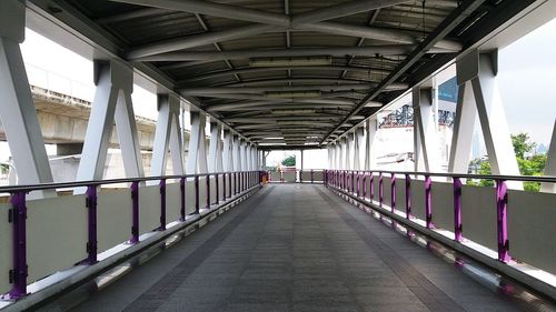 People walking on footbridge