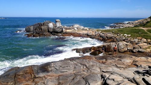 Scenic view of sea against clear sky