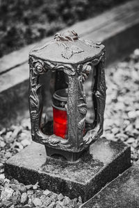 Close-up of cross on metal