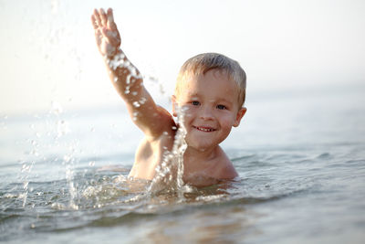 Close-up of young woman in swimming pool