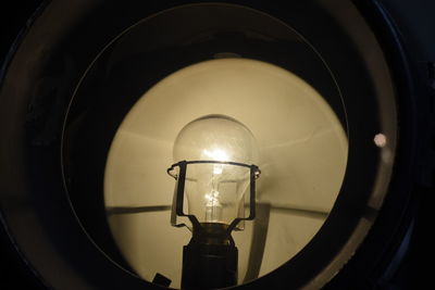 Close-up of illuminated light bulb