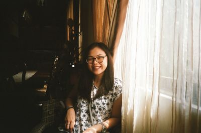 Portrait of smiling young woman