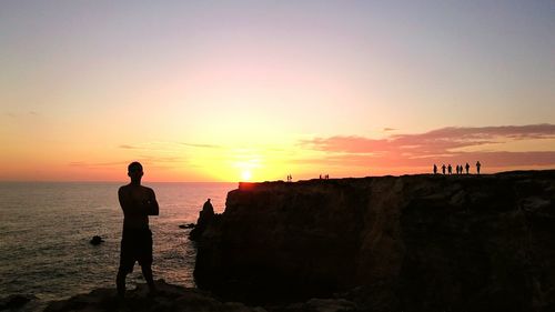 Scenic view of sea at sunset