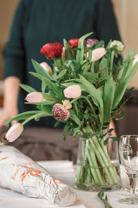 Close-up of bouquet of red roses on table