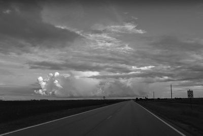 View of road against cloudy sky