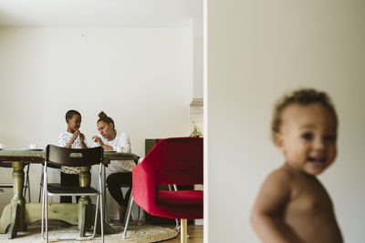 Mother with son at table