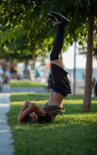 Side view of man exercising in park