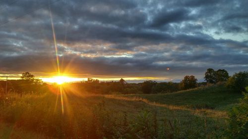 Sun shining through clouds